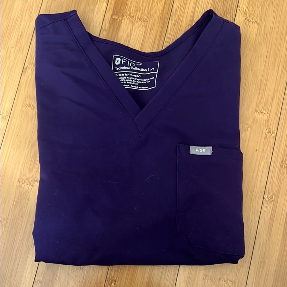 FIGS Catarina One-Pocket Scrub Top. PURPLE JAM